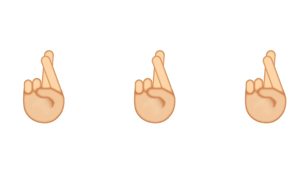 Emoji de los dedos cruzados
